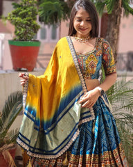 Bandhani Box With Flower Diwan Border Blue Sky Lehenga Choli With Mirror Work And Attached Yellow Dupatta