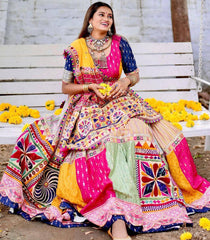 Gamthi Patch Style Multi Colour Lehenga Choli With Mirror Work And Attached Yellow Dupatta